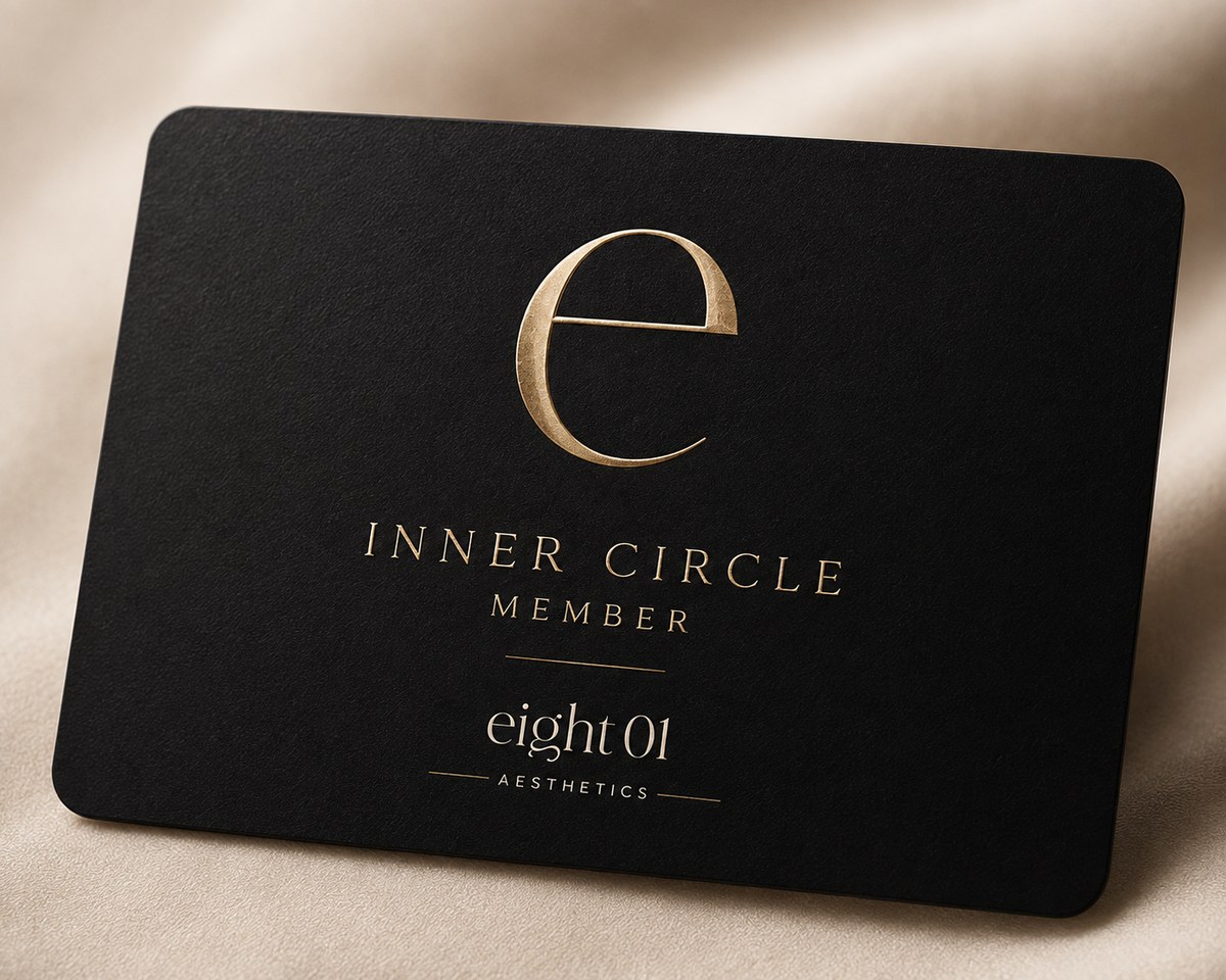 The eight 01 Inner Circle member card — black with gold foil